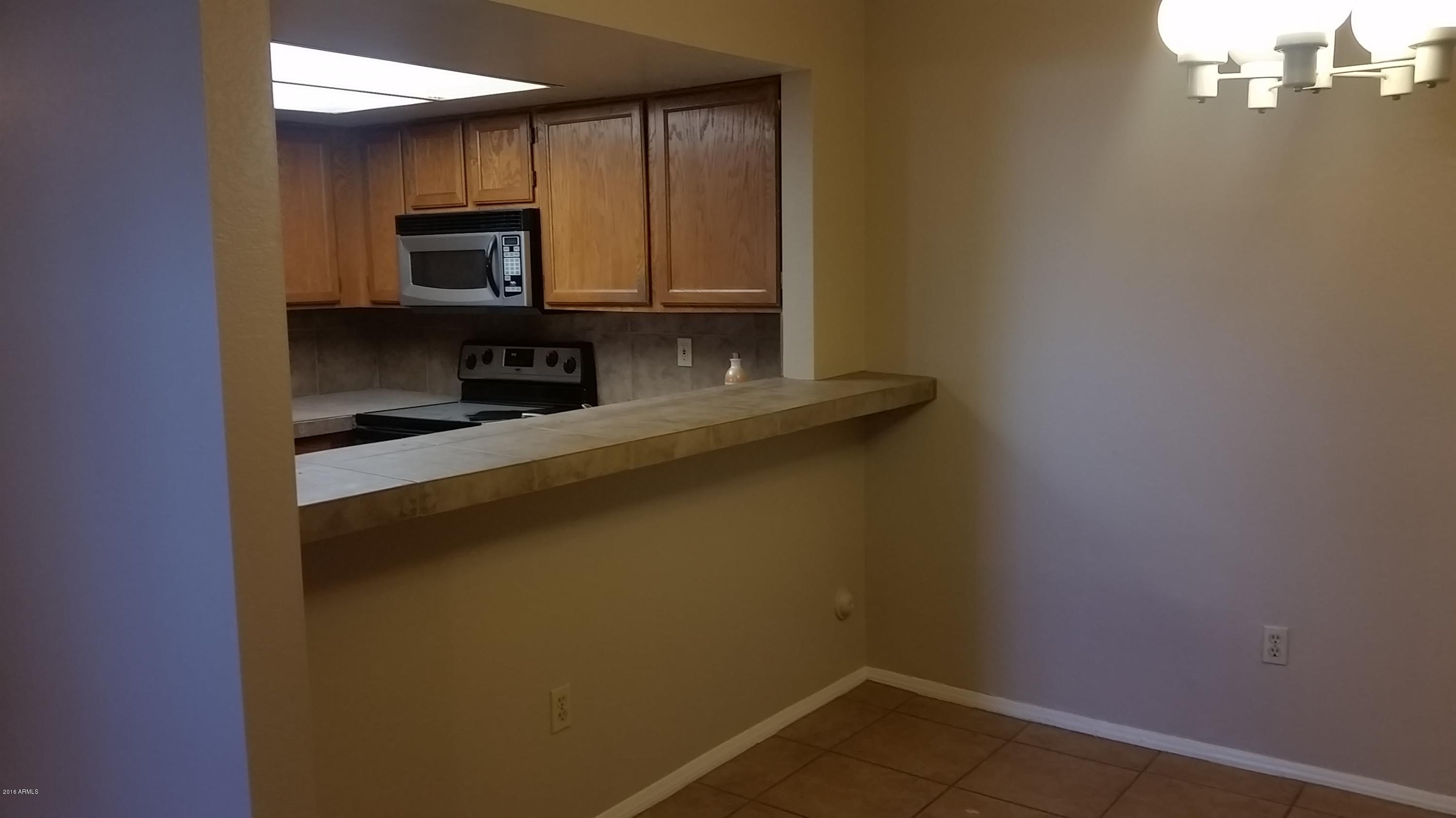 1645 West Baseline Road, Unit 1001 Mesa, AZ 85202 - Photo 5 of 17 Kitchen overlooking eat in kitchen area
