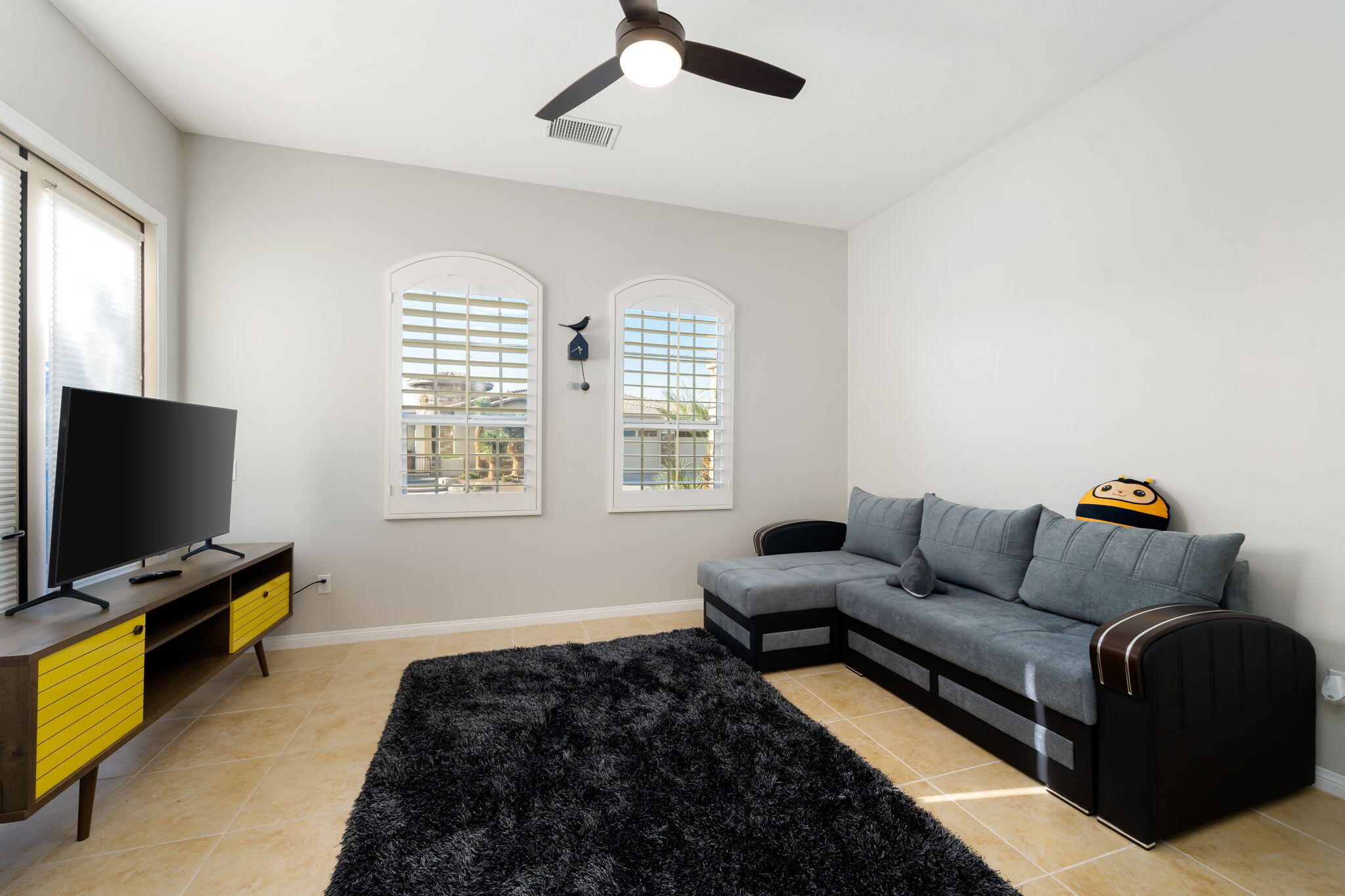 68 Via Del Pienza Rancho Mirage, CA 92270 - Photo 18 of 38 a living room with furniture and a flat screen tv