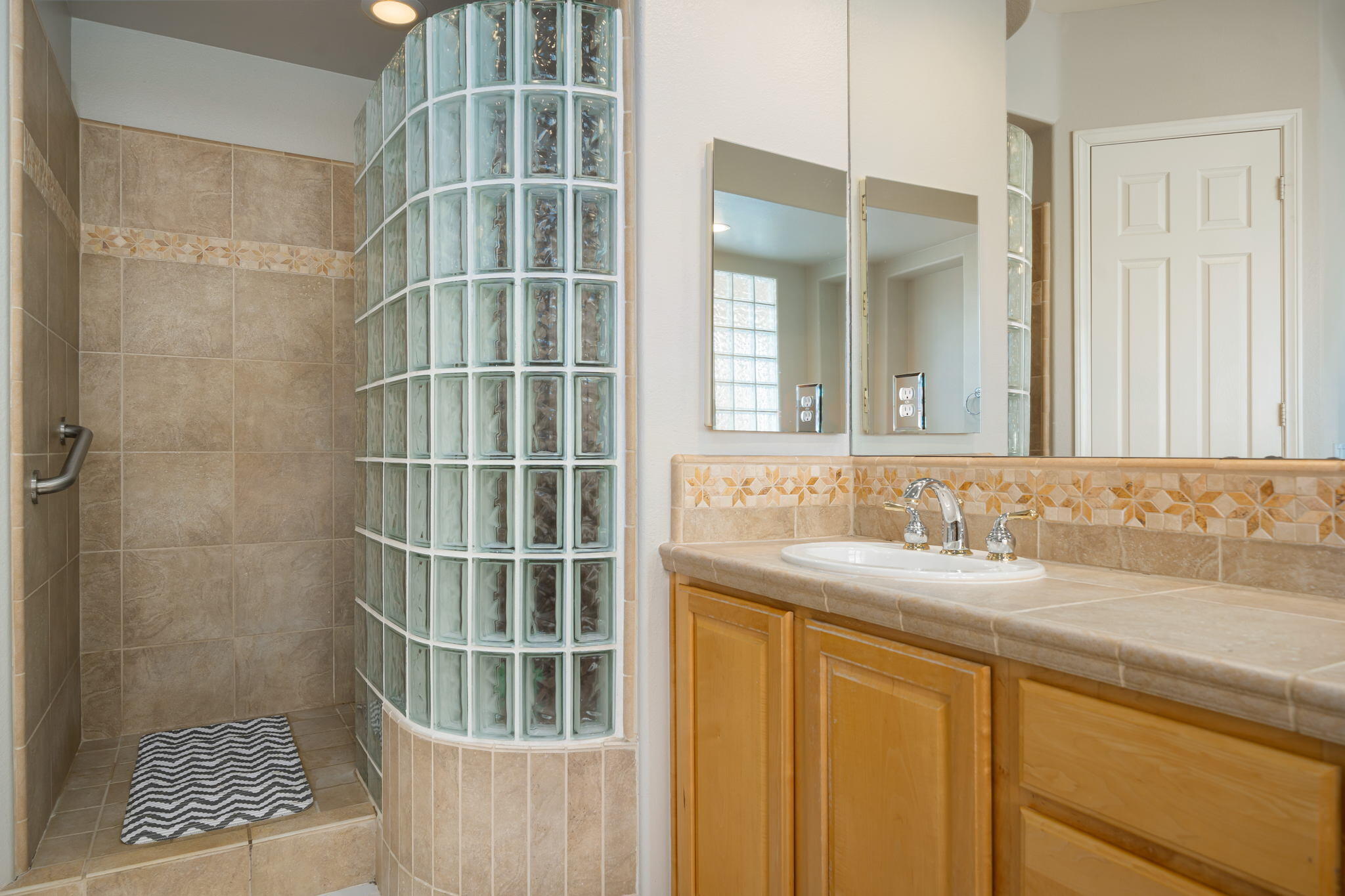 68 Via Del Pienza Rancho Mirage, CA 92270 - Photo 30 of 38 a bathroom with a sink and a mirror