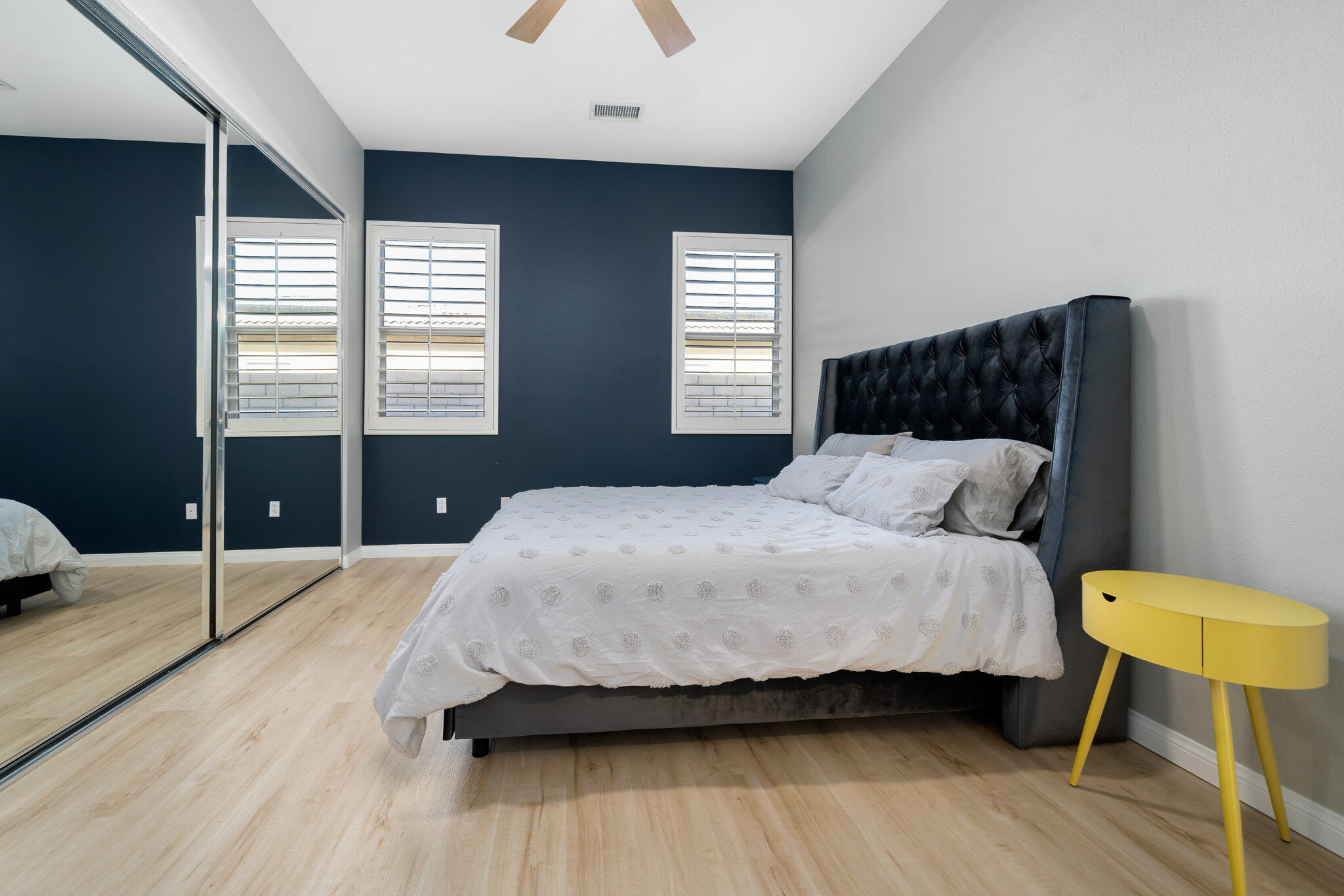 68 Via Del Pienza Rancho Mirage, CA 92270 - Photo 32 of 38 a bedroom with a bed and wooden floor