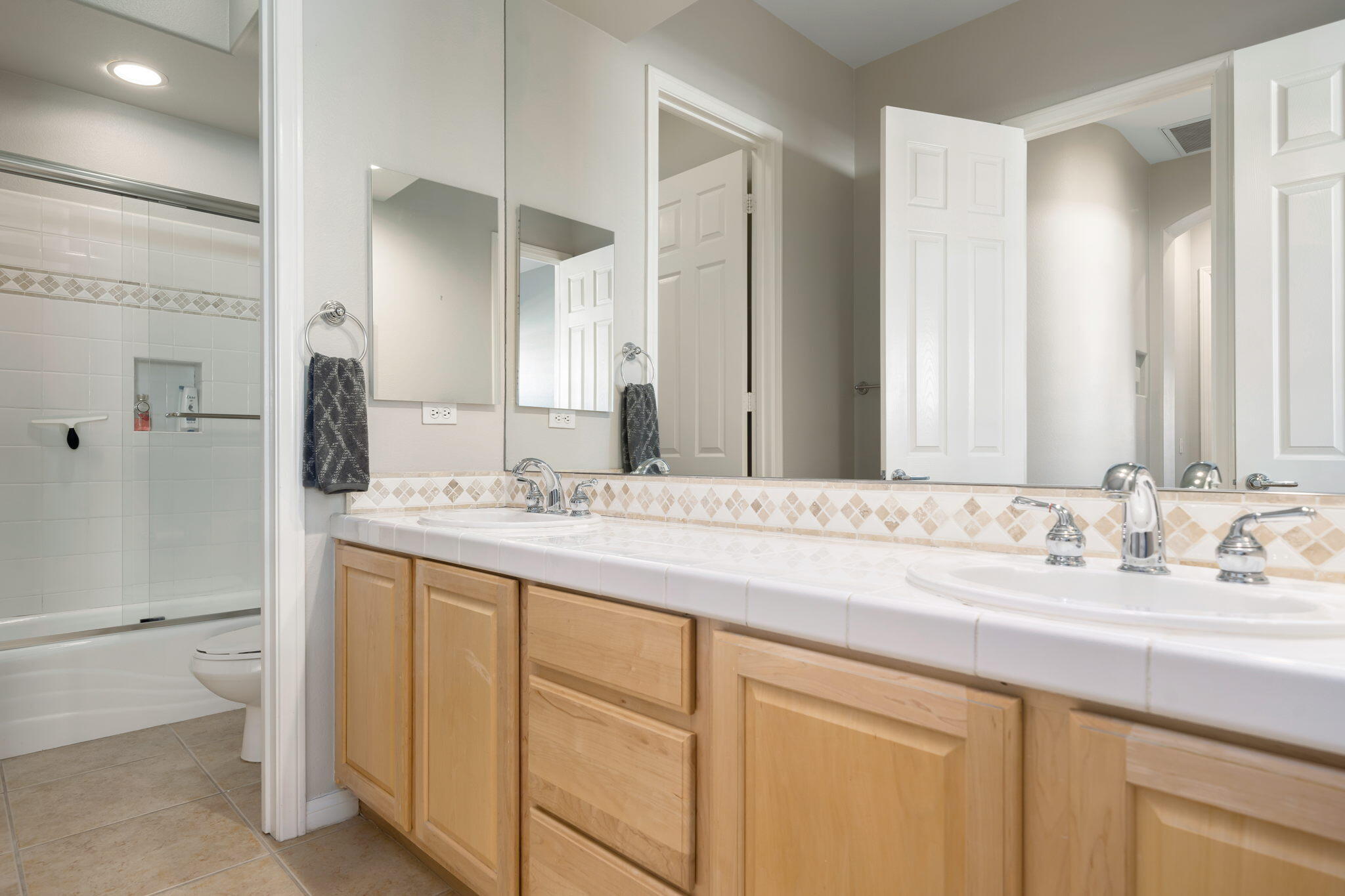 68 Via Del Pienza Rancho Mirage, CA 92270 - Photo 33 of 38 a bathroom with a double vanity sink mirror and double