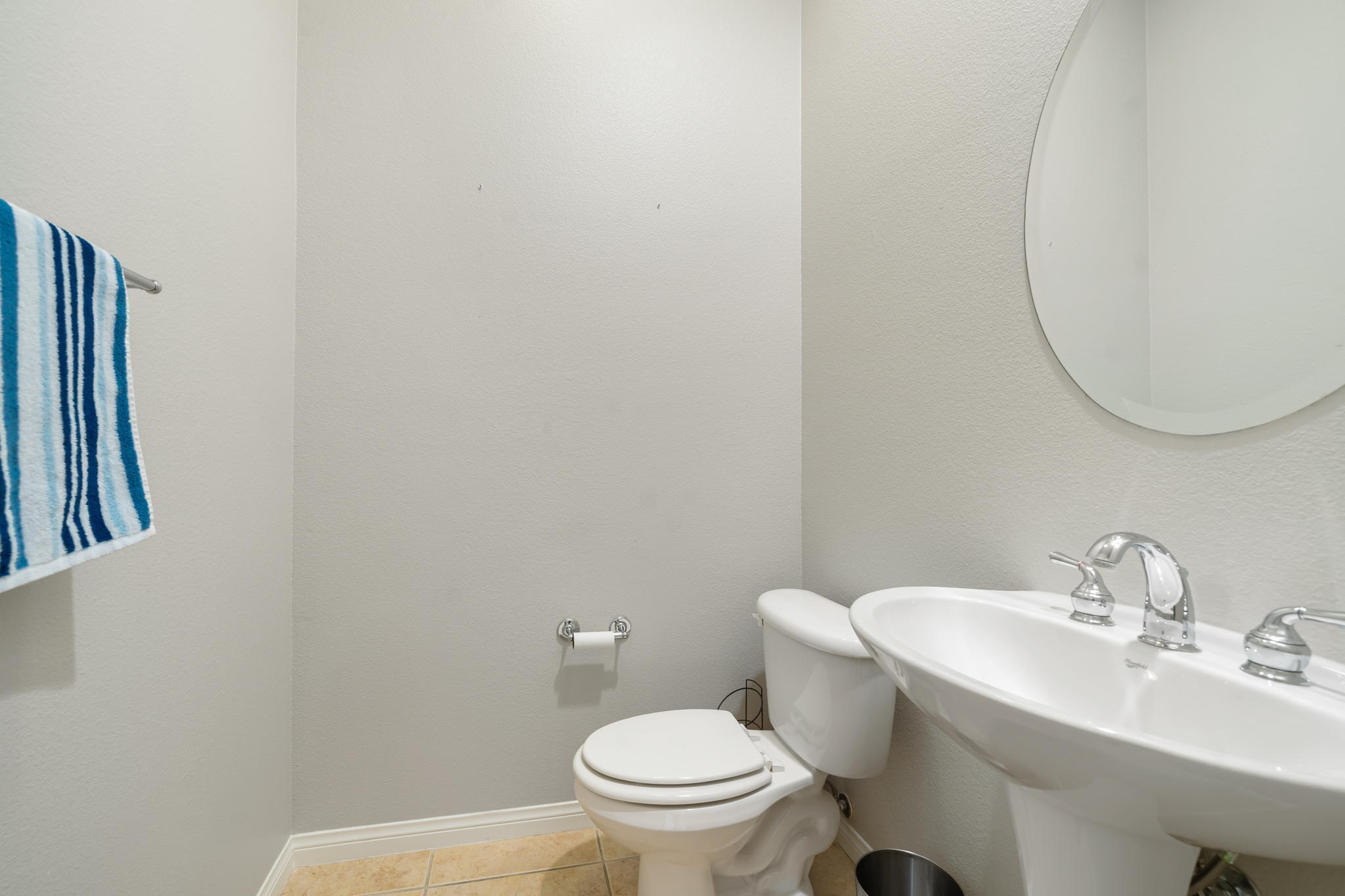68 Via Del Pienza Rancho Mirage, CA 92270 - Photo 34 of 38 a bathroom with a sink a toilet and a mirror