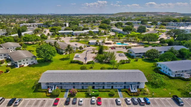 a view of chairs and tables in a patio
