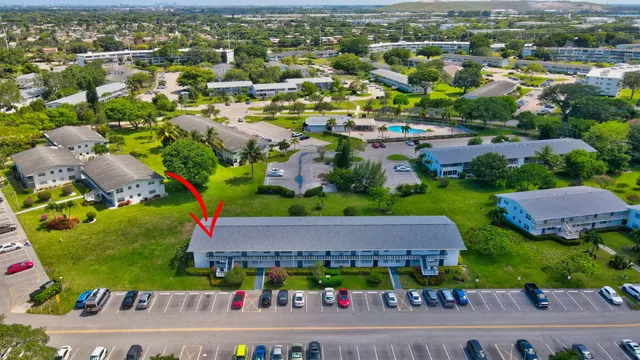 a view of gallery with wooden floor
