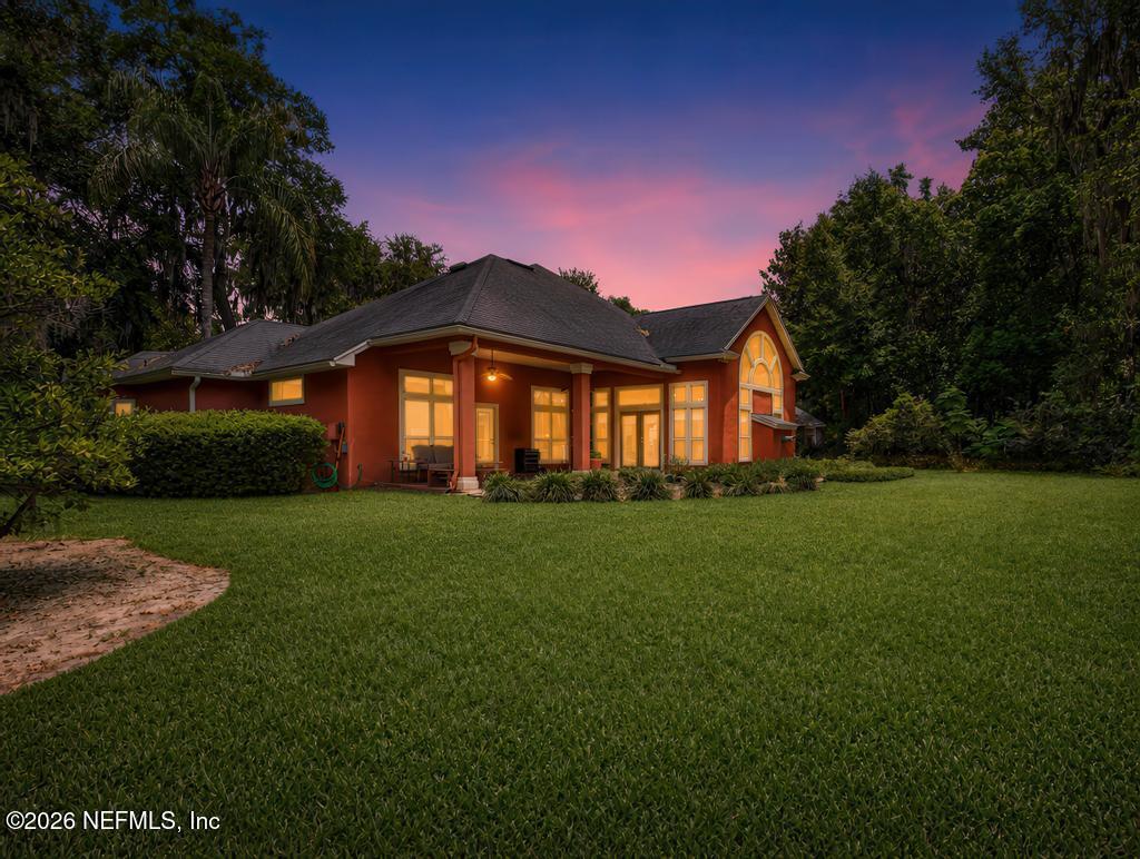 1483 Bridgette Way Fleming Island, FL 32003 - Photo 8 of 63 a front view of a house with a yard