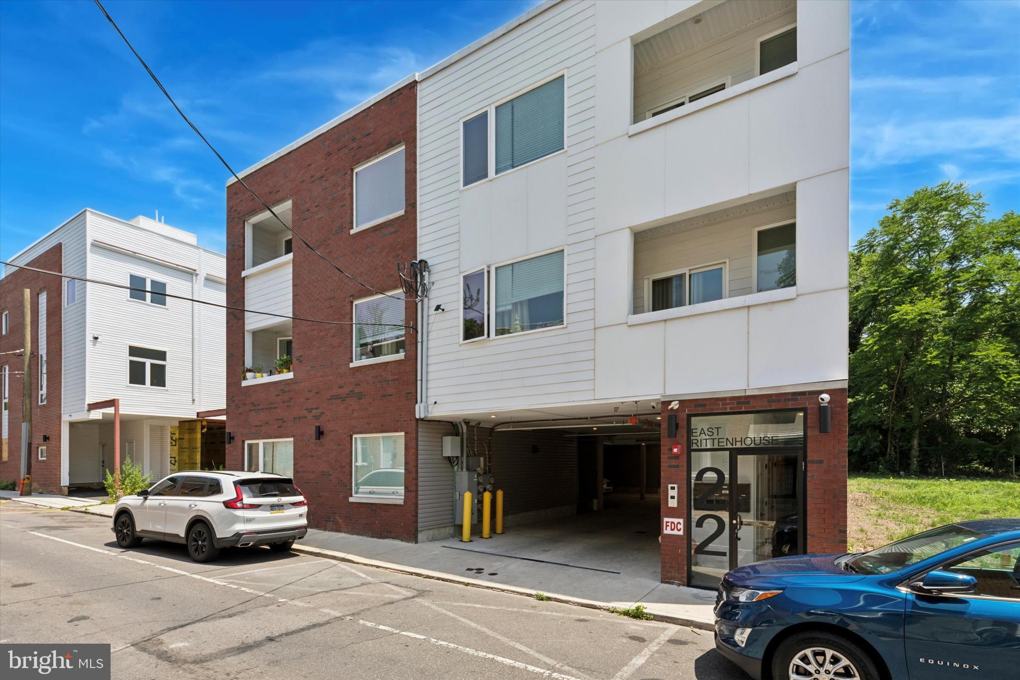 22 East Rittenhouse Street Philadelphia, PA 19144 - Photo 1 of 34 a car parked in front of a building