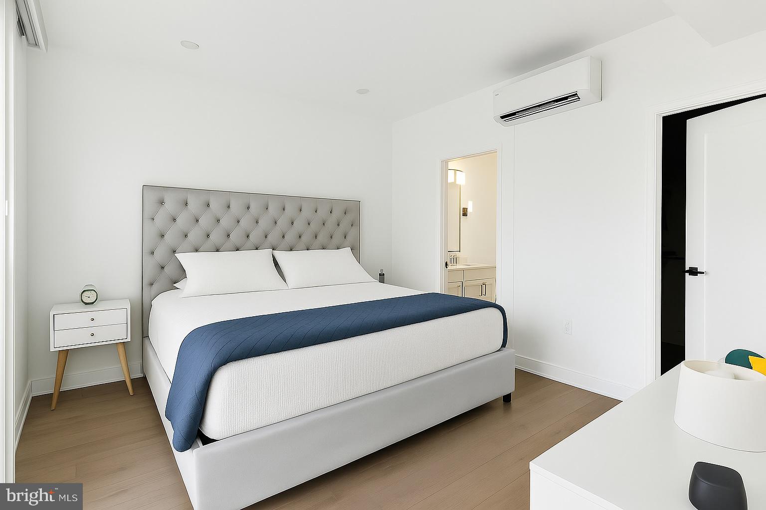 22 East Rittenhouse Street Philadelphia, PA 19144 - Photo 16 of 34 a bedroom with a bed and a couch