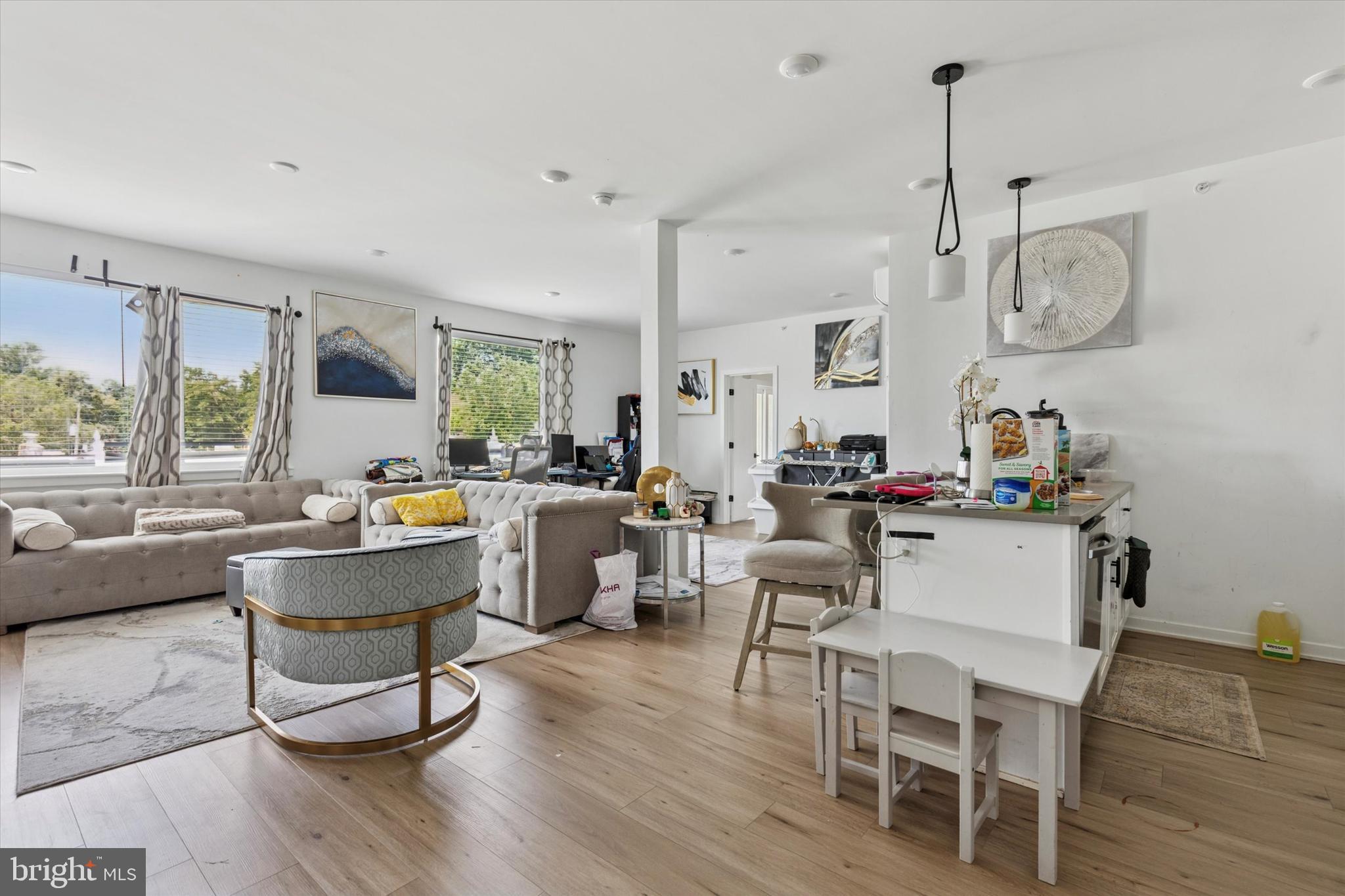 22 East Rittenhouse Street Philadelphia, PA 19144 - Photo 18 of 34 a living room with furniture a window and gym equipment
