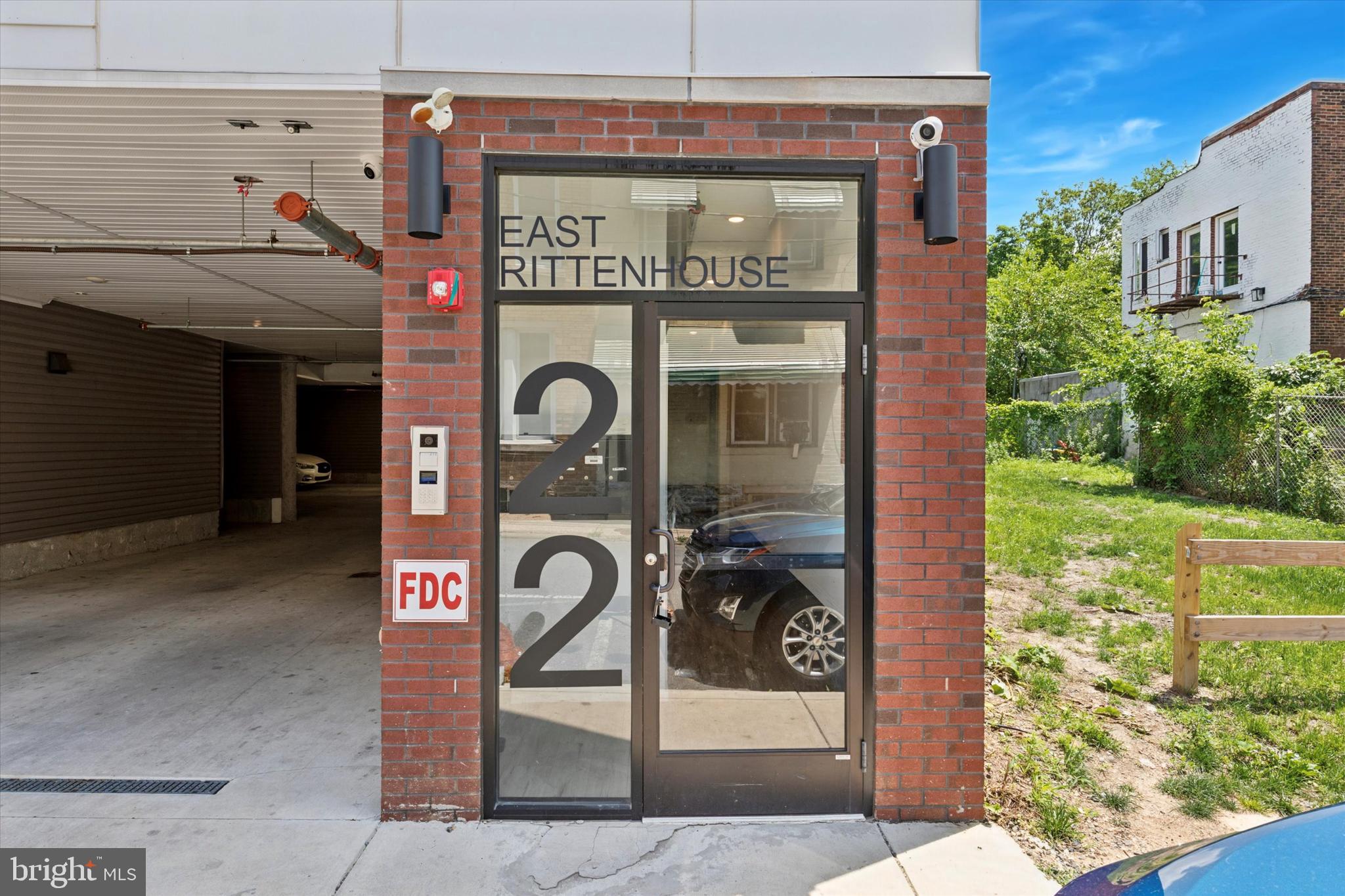 22 East Rittenhouse Street Philadelphia, PA 19144 - Photo 2 of 34 a front view of a building with a garden