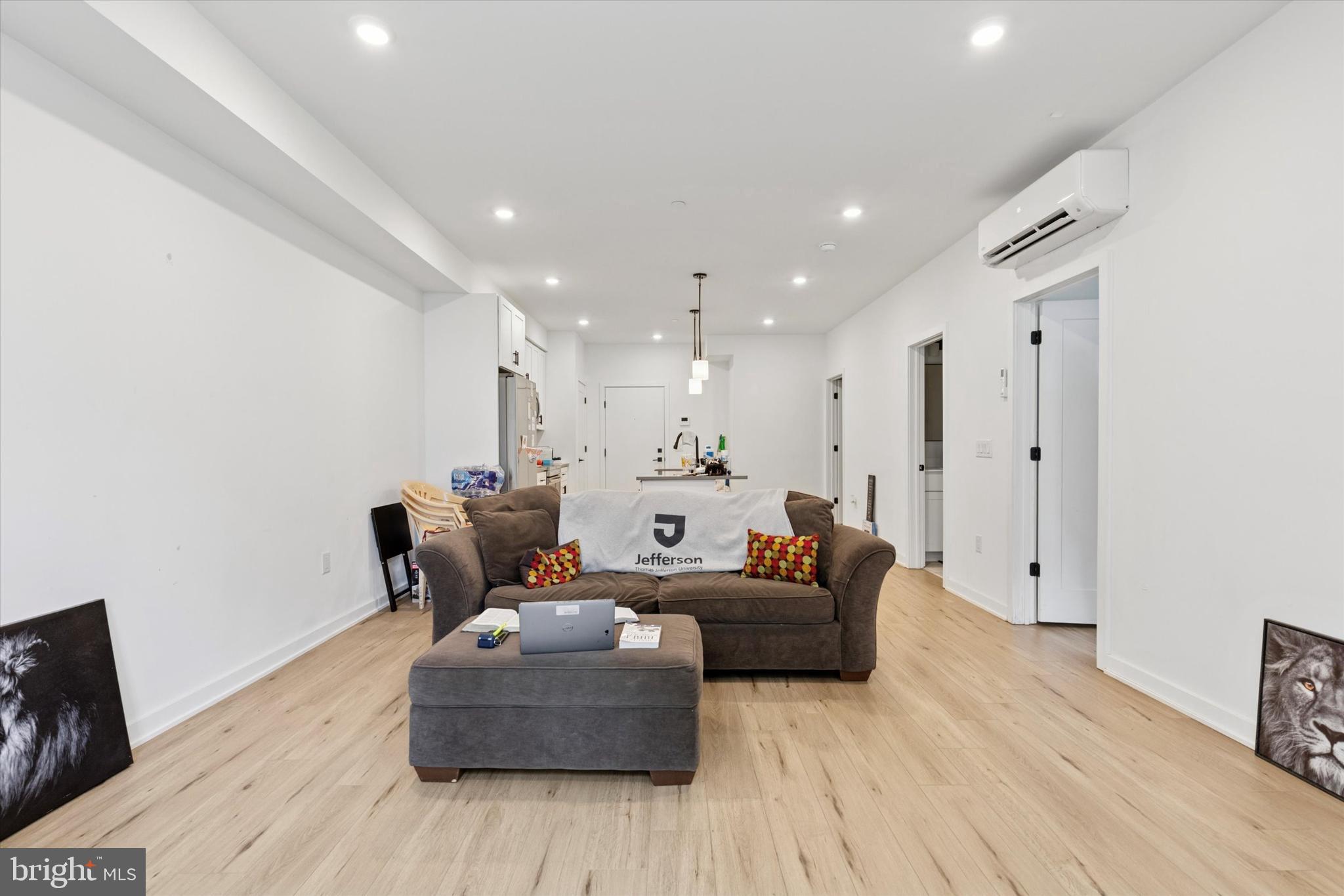 22 East Rittenhouse Street Philadelphia, PA 19144 - Photo 23 of 34 a living room with furniture and a wooden floor