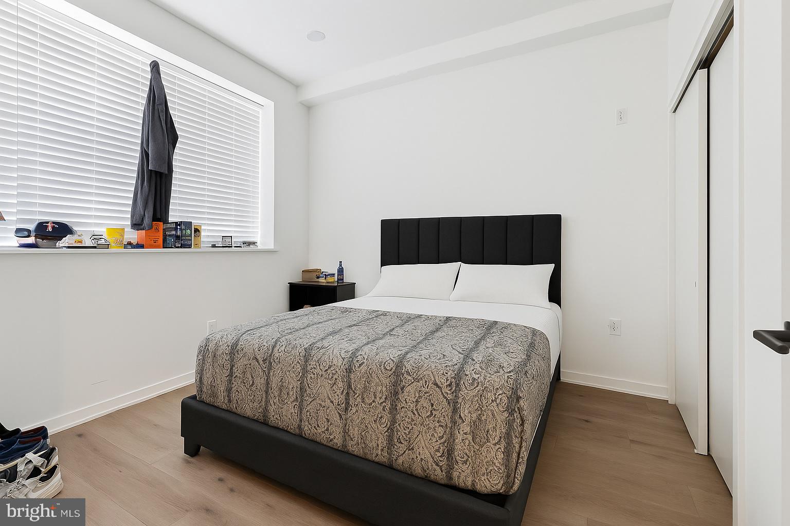 22 East Rittenhouse Street Philadelphia, PA 19144 - Photo 26 of 34 a bedroom with a bed and window