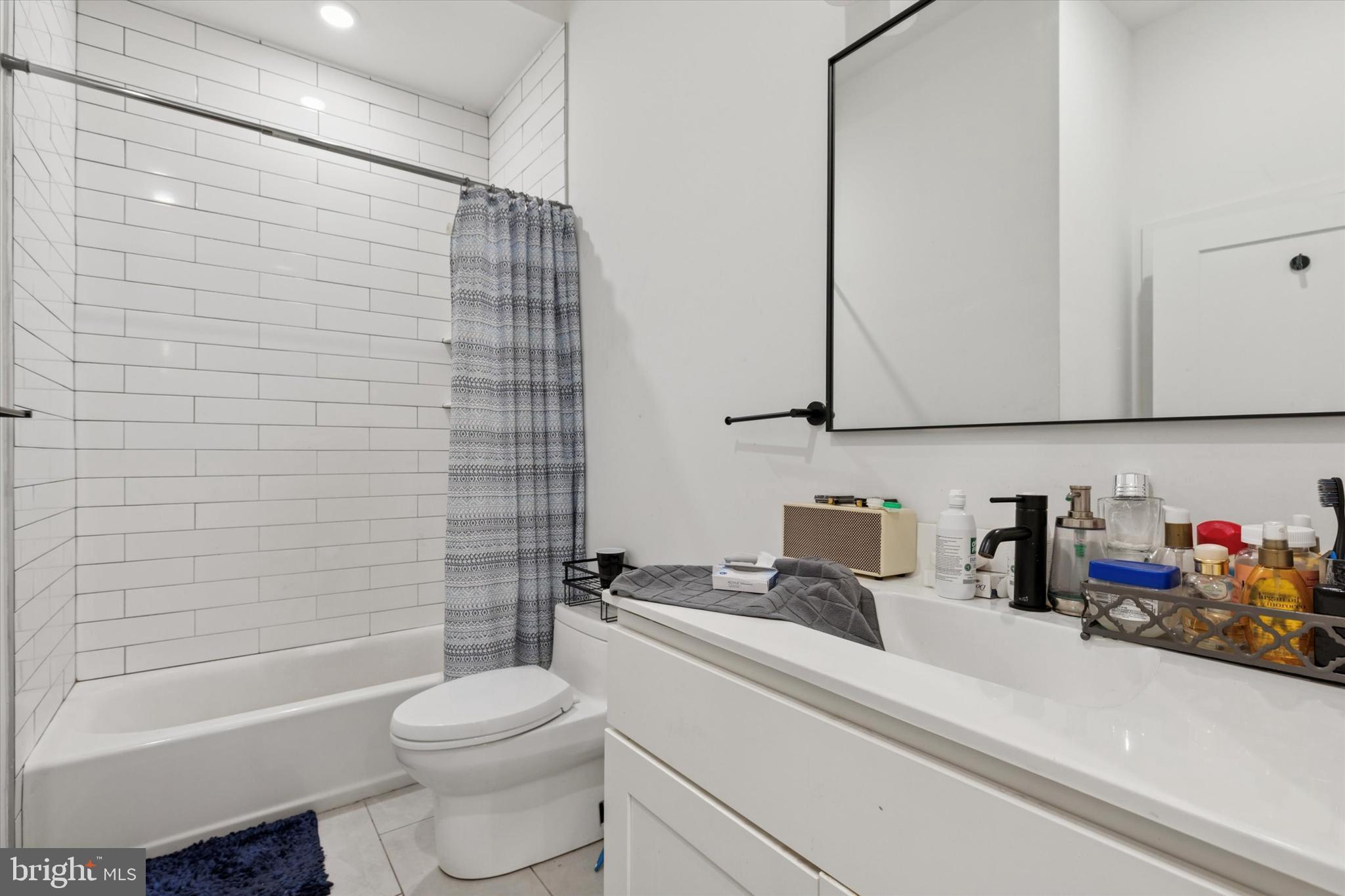 22 East Rittenhouse Street Philadelphia, PA 19144 - Photo 27 of 34 a bathroom with a sink a toilet and bathtub