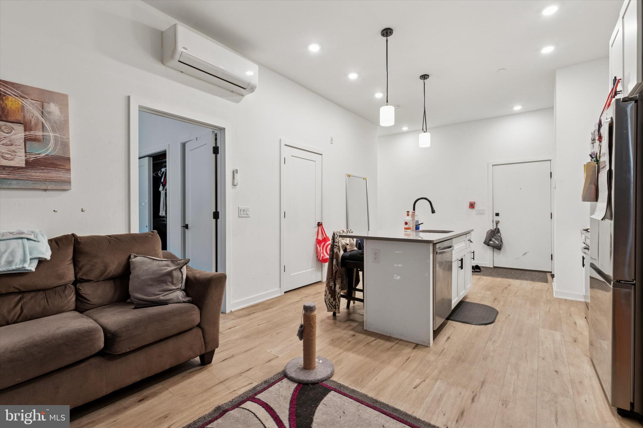 22 East Rittenhouse Street Philadelphia, PA 19144 - Photo 28 of 34 a living room with furniture and a flat screen tv