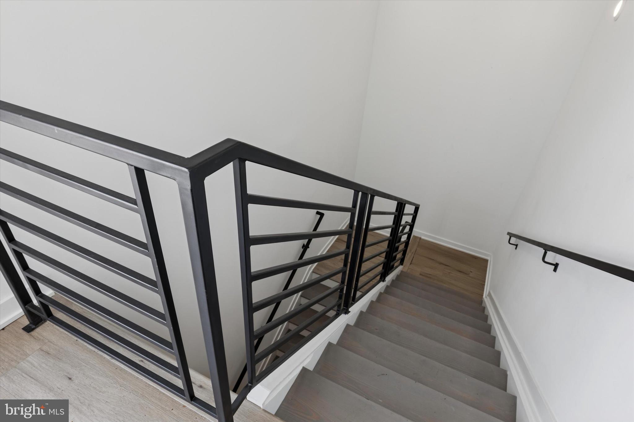 22 East Rittenhouse Street Philadelphia, PA 19144 - Photo 33 of 34 a view of staircase with railing and white walls
