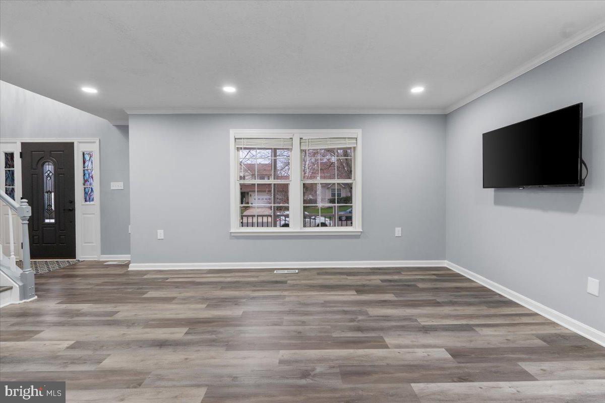 10415 Labrador Loop Manassas, VA 20112 - Photo 28 of 66 a view of a livingroom with a flat screen tv