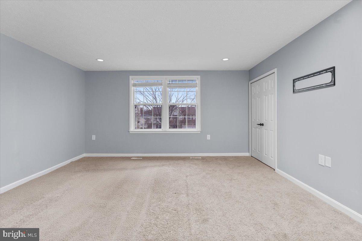 10415 Labrador Loop Manassas, VA 20112 - Photo 41 of 66 a view of an empty room with a window