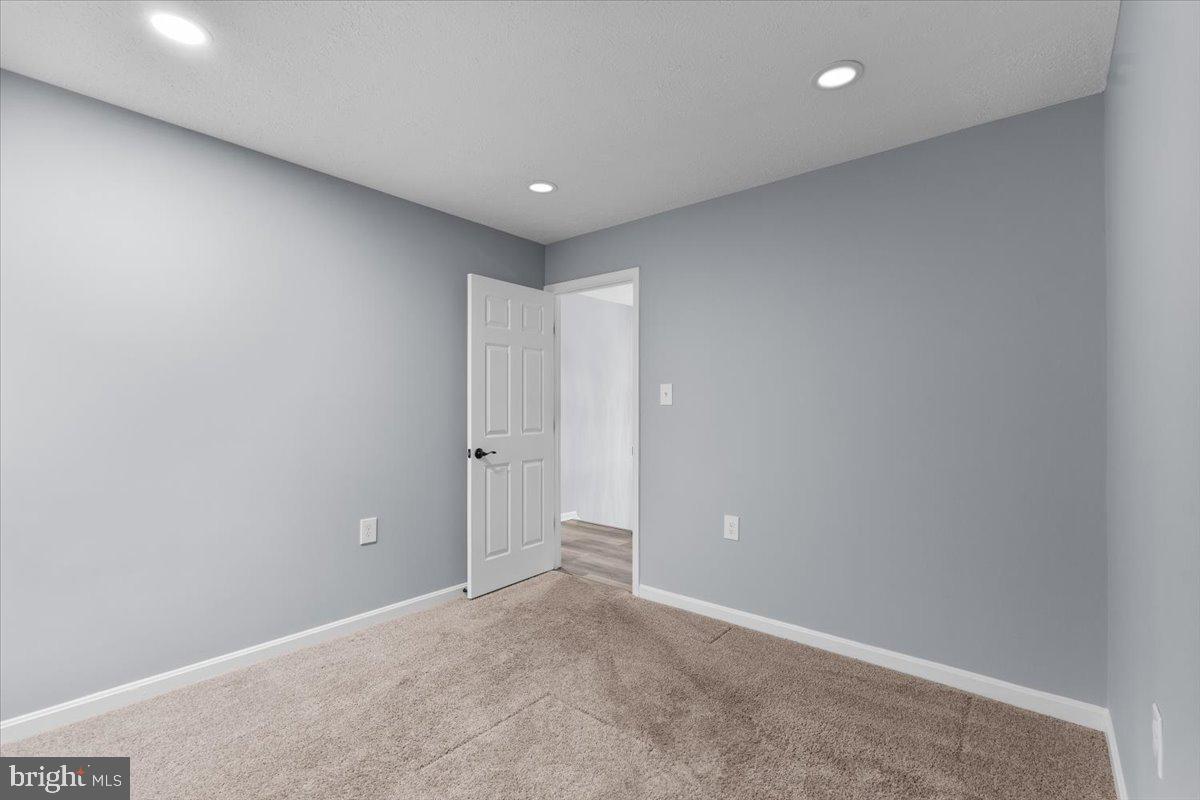 10415 Labrador Loop Manassas, VA 20112 - Photo 47 of 66 a view of an empty room