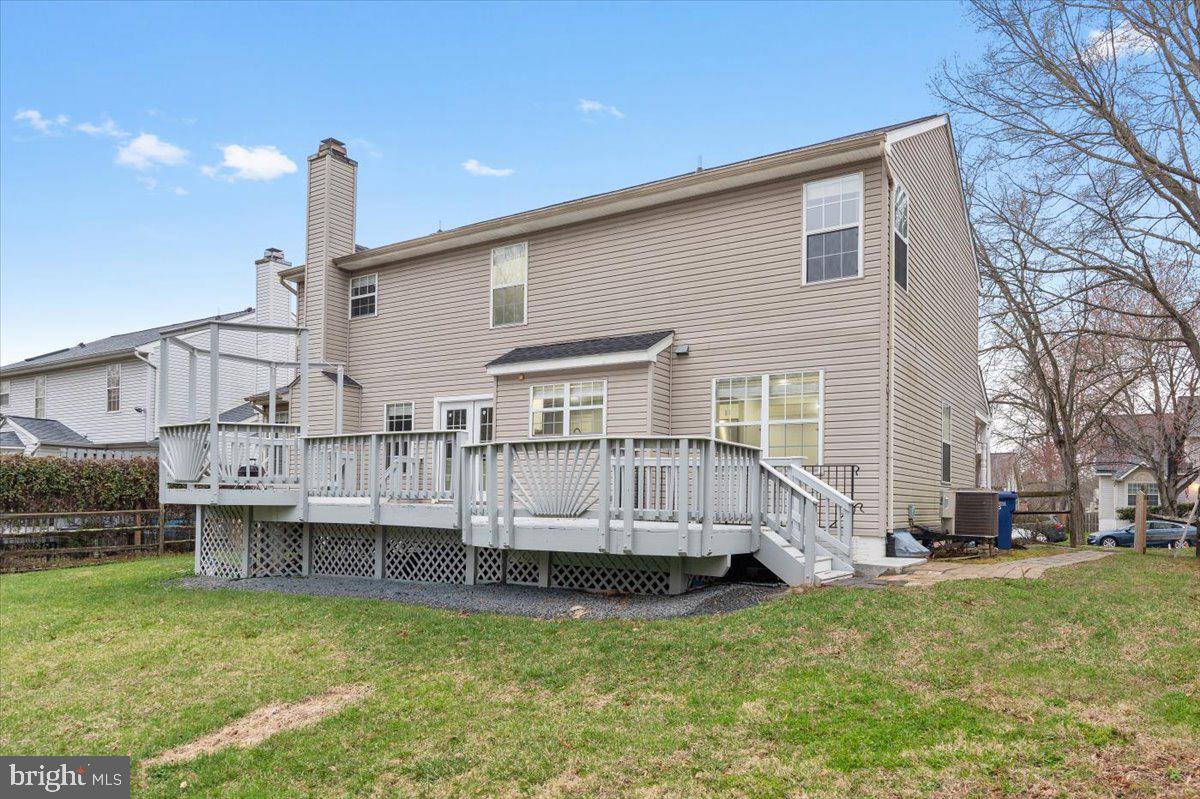 10415 Labrador Loop Manassas, VA 20112 - Photo 64 of 66 a view of house with a big yard