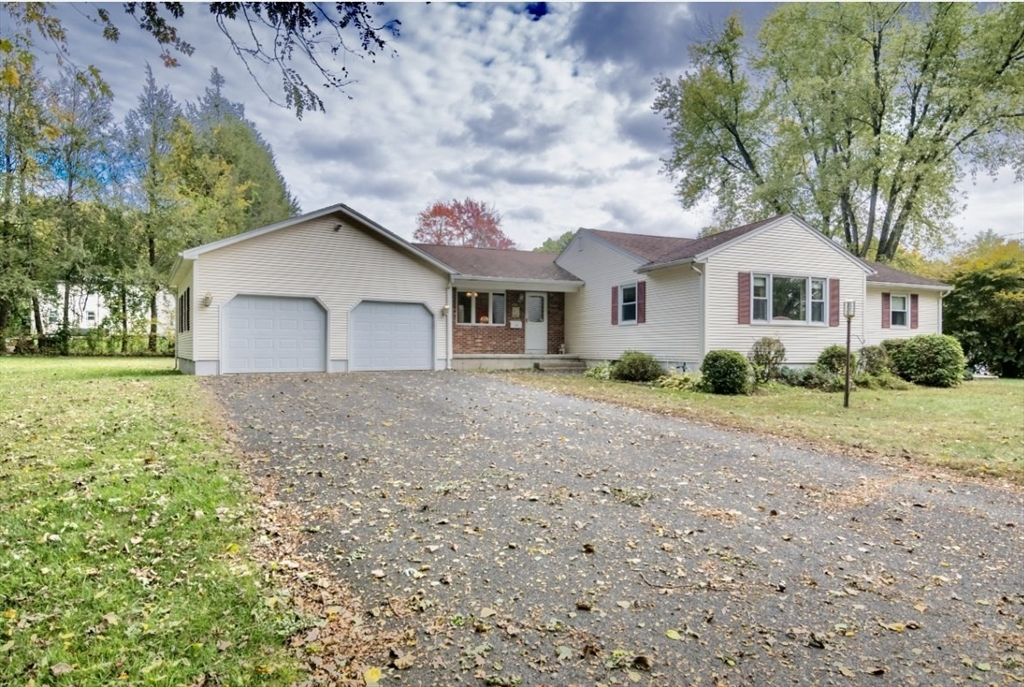 195 Mildred Avenue Springfield, MA 01104 - Photo 1 of 32 a front view of house with yard and green space