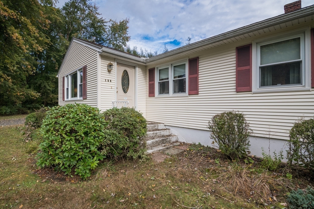 195 Mildred Avenue Springfield, MA 01104 - Photo 27 of 32 a front view of a house with garden
