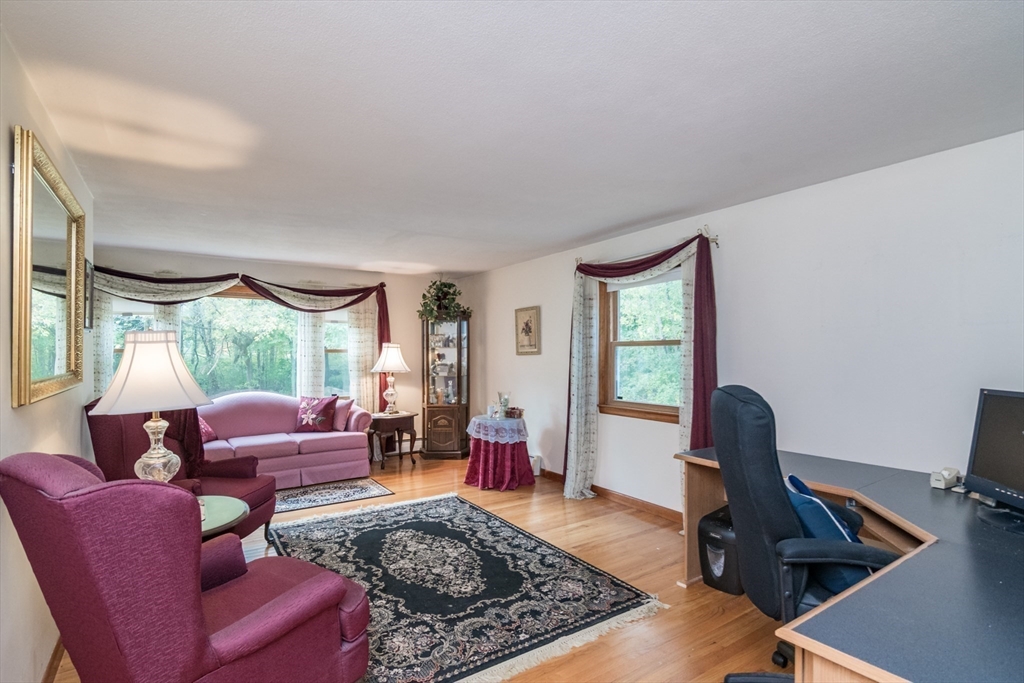 195 Mildred Avenue Springfield, MA 01104 - Photo 10 of 32 a living room with furniture and a window