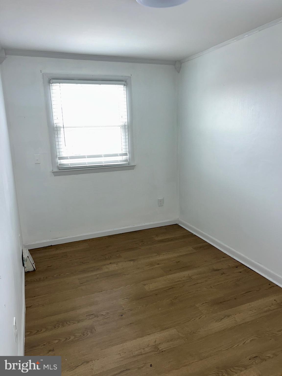 4655 Benson Street Philadelphia, PA 19136 - Photo 24 of 47 an empty room with a window