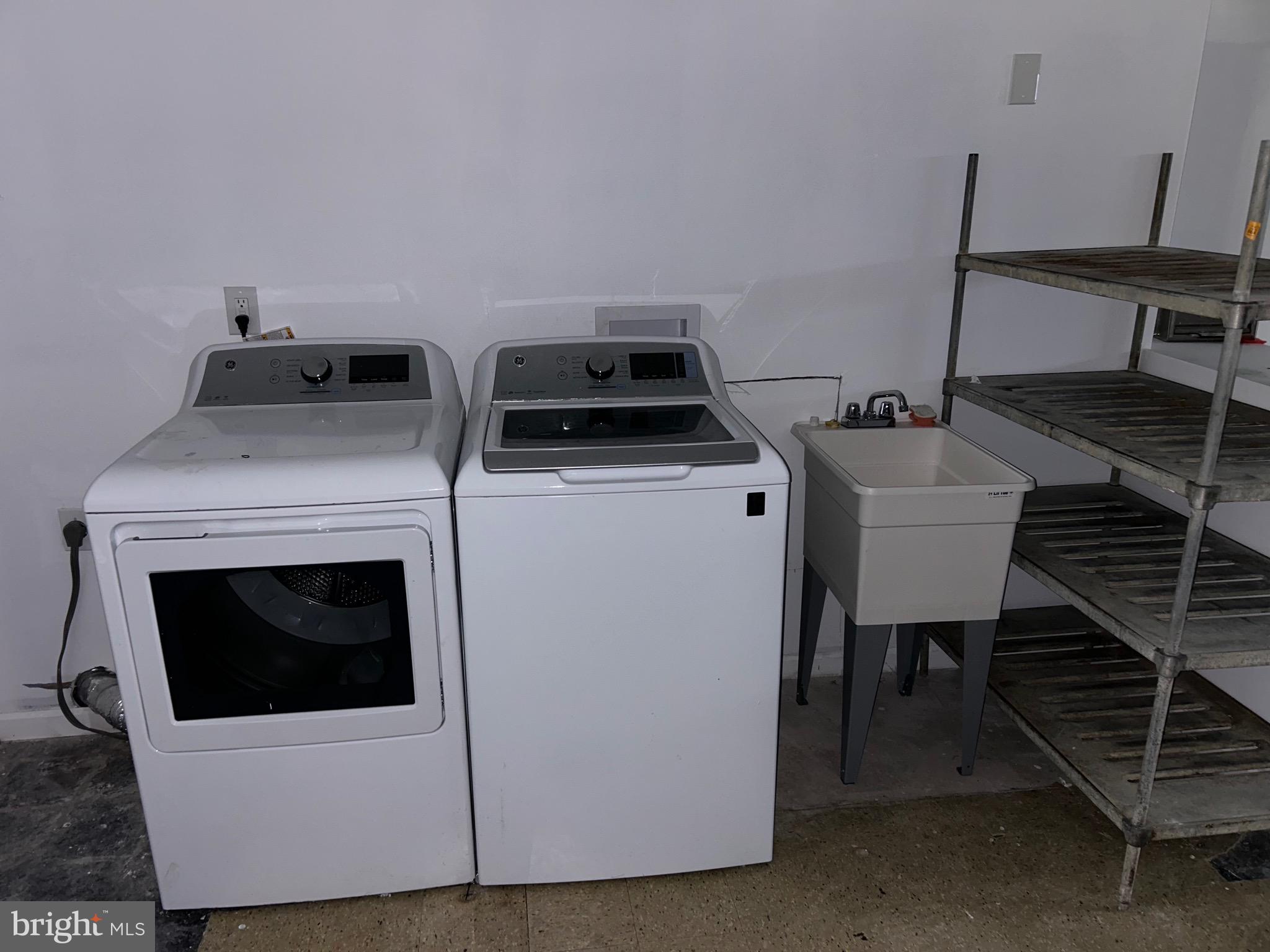 4655 Benson Street Philadelphia, PA 19136 - Photo 31 of 47 a utility room with dryer and washer