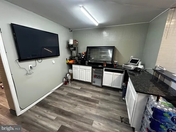a kitchen with granite countertop lots of counter top space