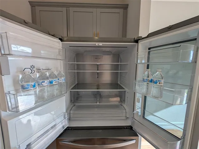 en empty room with windows