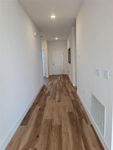 a bathroom with a sink a bathtub and a mirror