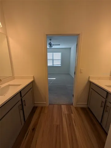 a bathroom with a glass shower door