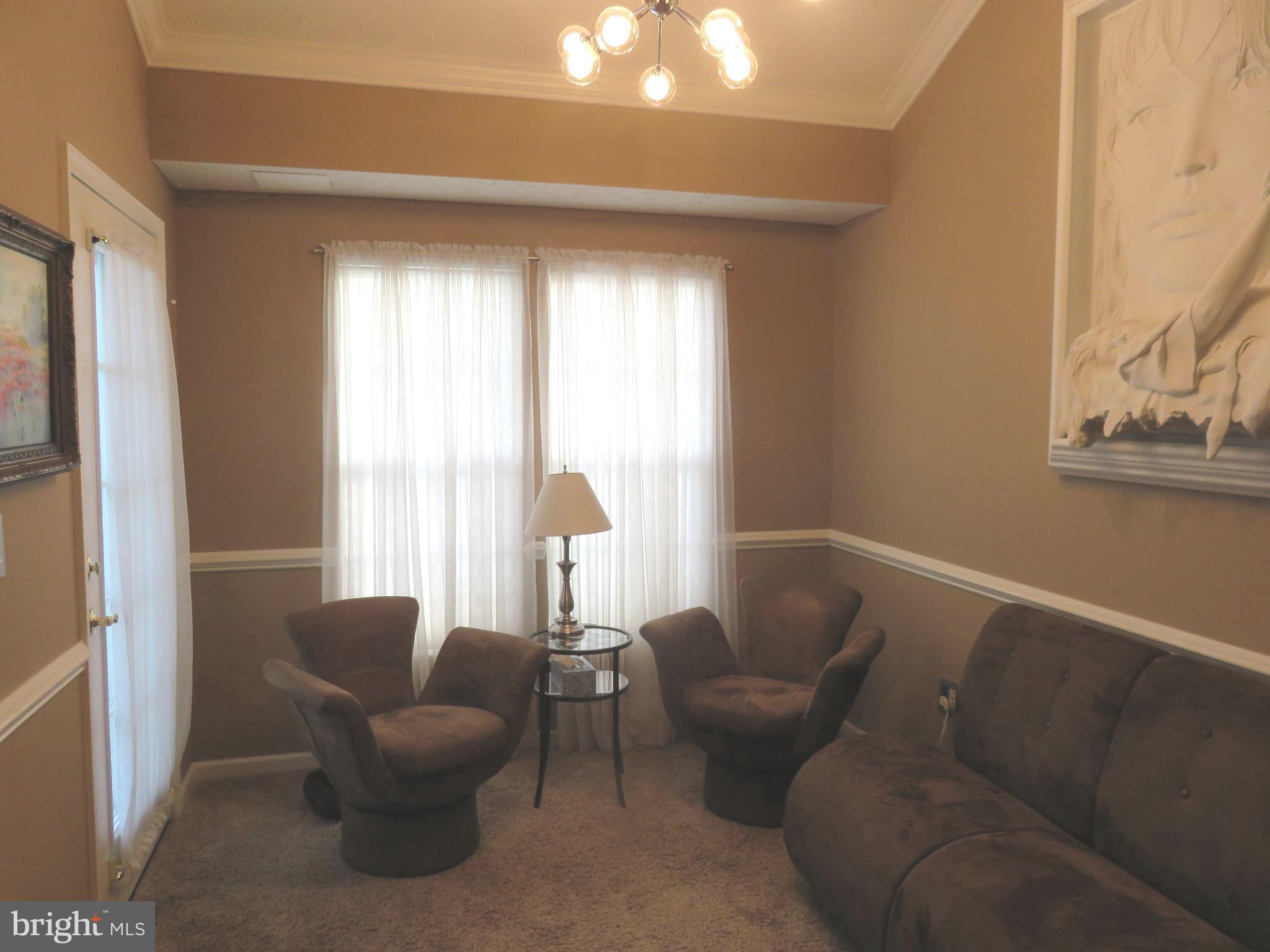 DINING ROOM CURRENTLY USED AS TV ROOM