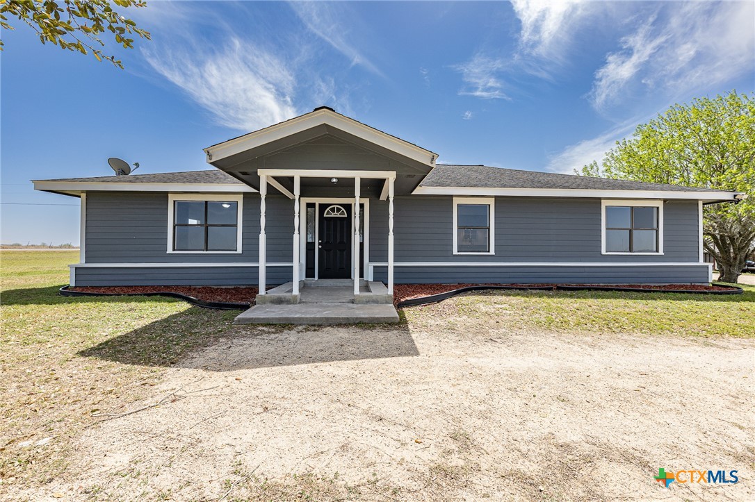 985 County Road 301 Shiner, TX 77984 - Photo 2 of 31 a view of a house with a yard