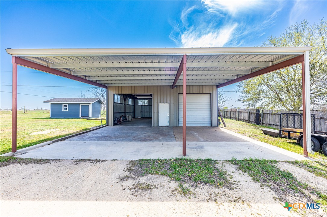 985 County Road 301 Shiner, TX 77984 - Photo 22 of 31 a view of a house with tub and outdoor space