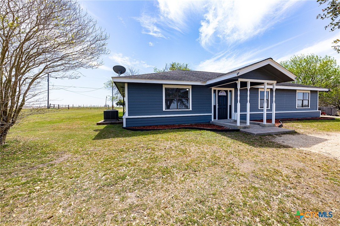 985 County Road 301 Shiner, TX 77984 - Photo 30 of 31 a view of a house with a yard