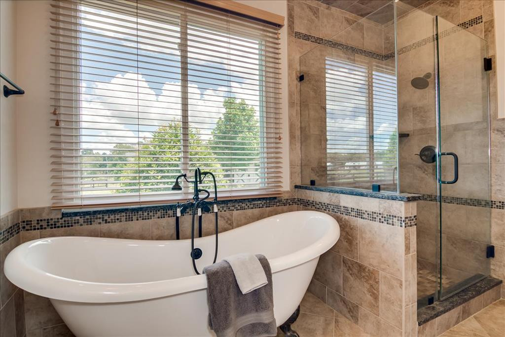 237 Implement Road Aiken, SC 29803 - Photo 17 of 43 a bath tub sitting next to a window