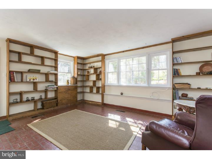 262 Devonshire Road Devon, PA 19333 - Photo 18 of 23 a living room with furniture and a flat screen tv