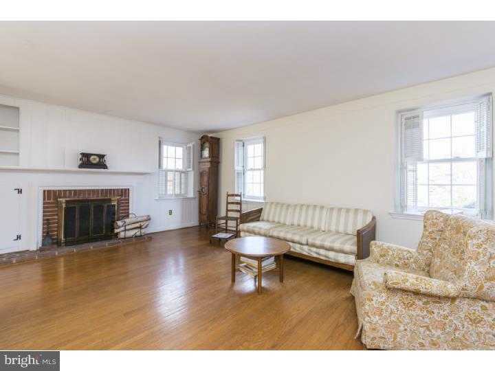 262 Devonshire Road Devon, PA 19333 - Photo 5 of 23 a living room with furniture and a fireplace