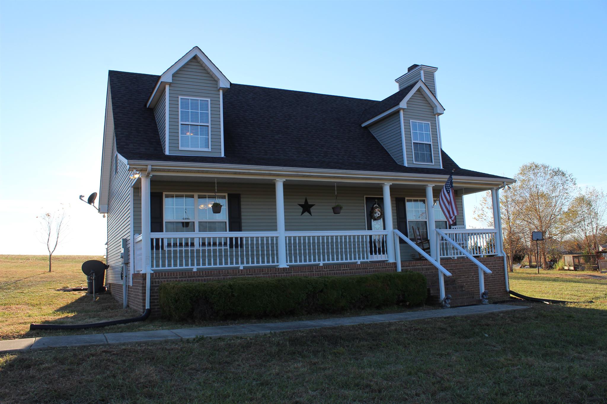 525 Martin Chapel Road Portland, TN 37148 - Photo 2 of 29 a front view of a house with a yard