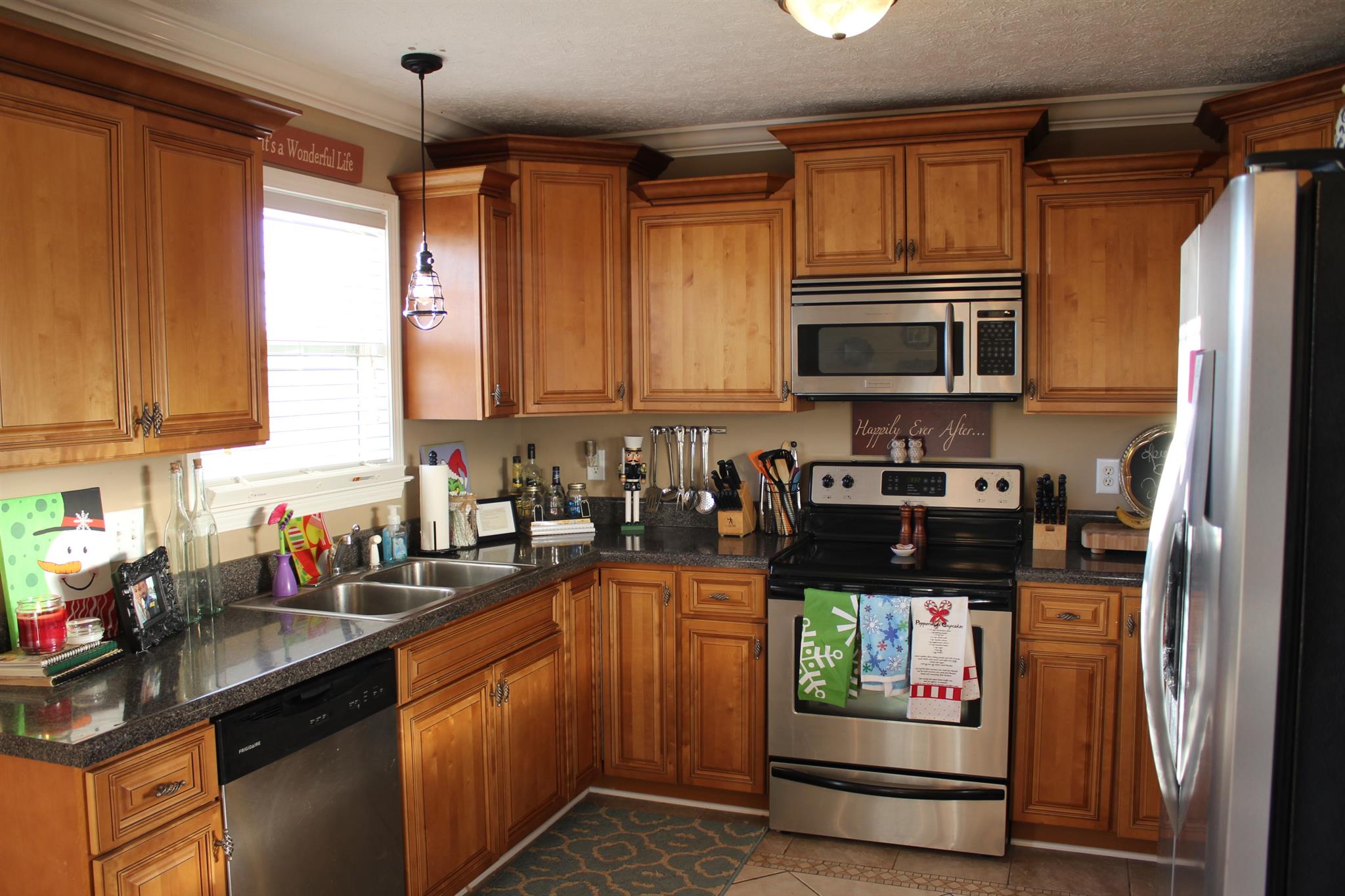 525 Martin Chapel Road Portland, TN 37148 - Photo 14 of 29 a kitchen with stainless steel appliances granite countertop a refrigerator and a sink