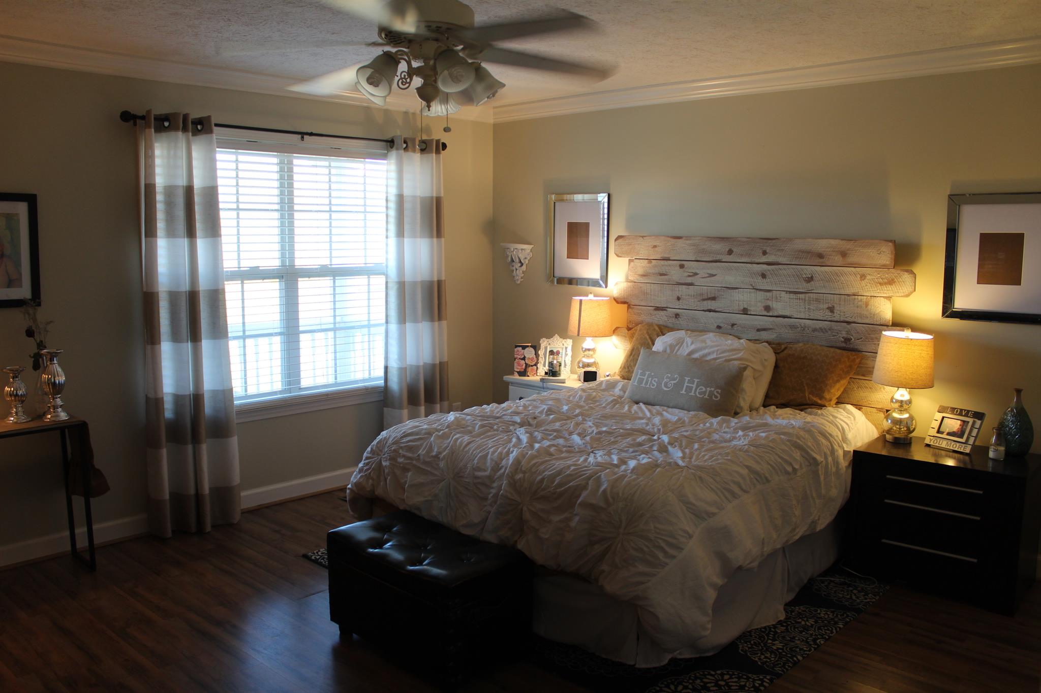 525 Martin Chapel Road Portland, TN 37148 - Photo 18 of 29 a bedroom with a bed and wooden floor