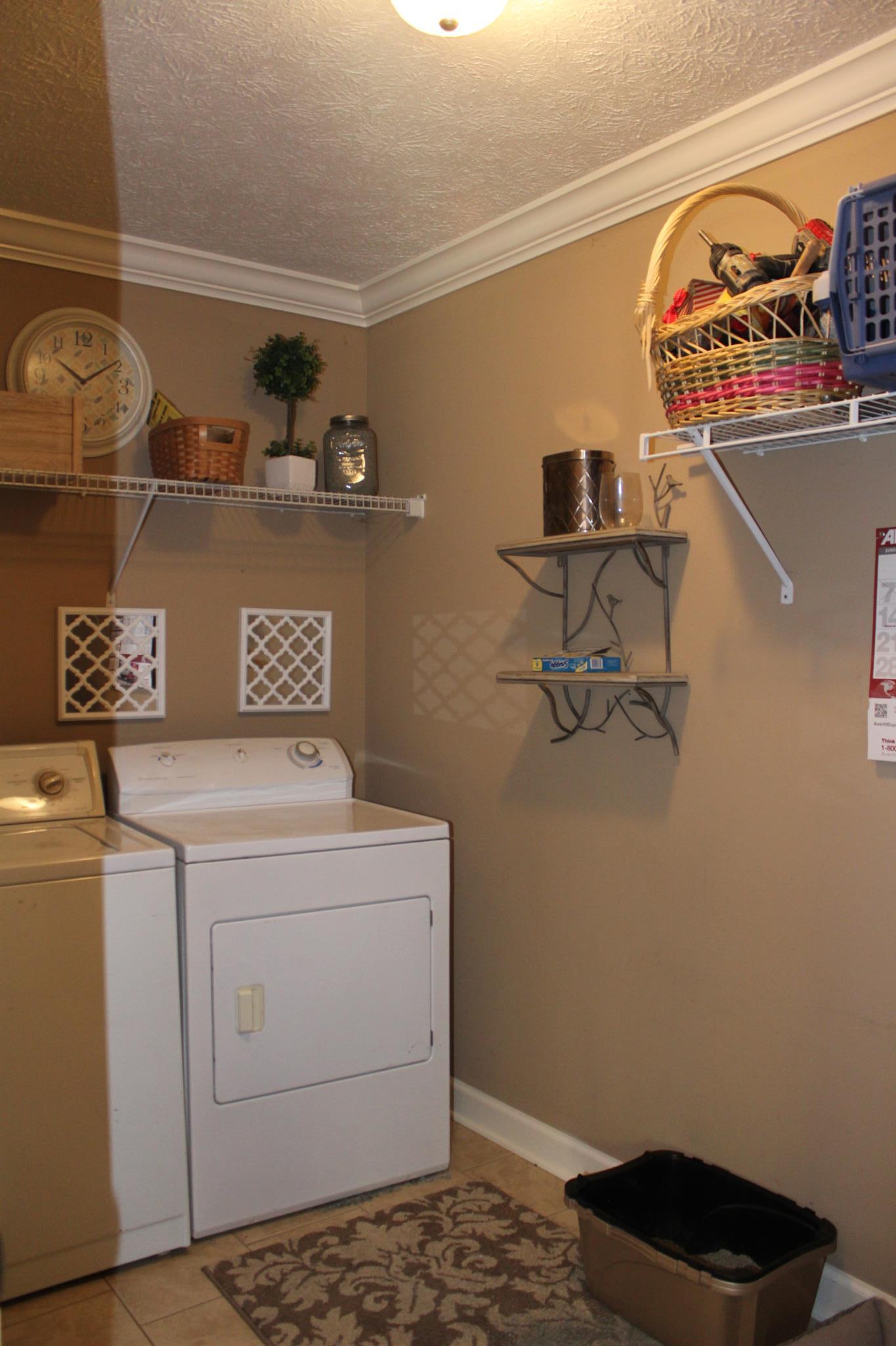 525 Martin Chapel Road Portland, TN 37148 - Photo 28 of 29 a utility room with dryer and washer
