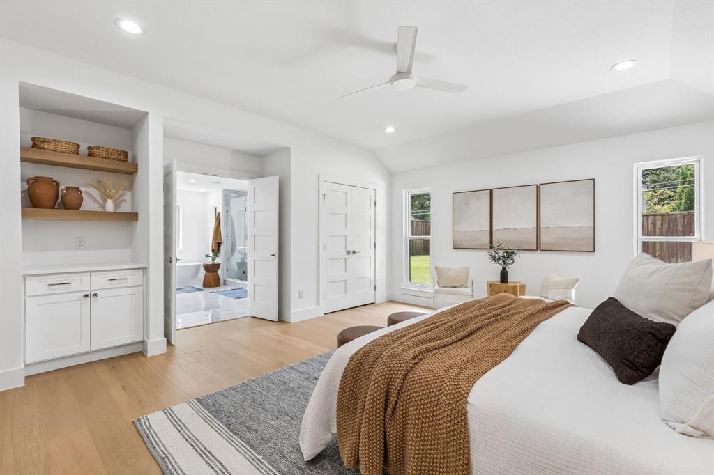 7124 Meadow Road Dallas, TX 75230 - Photo 20 of 36 Primary bedroom offers space for coffee bar,2 closets,& en suite spa like bath
