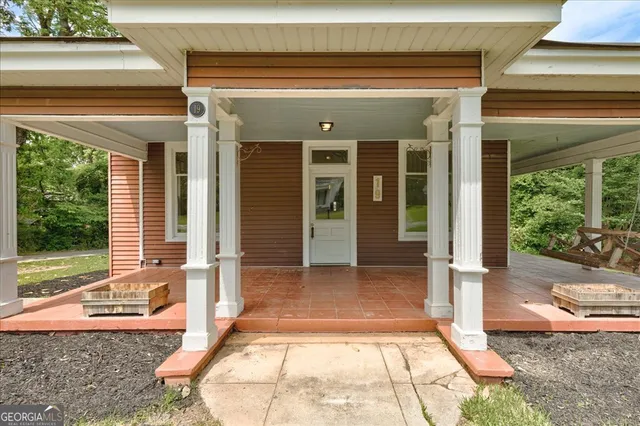 a view of a entryway door front of house