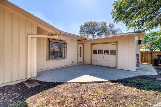 a view of a big room with a large window