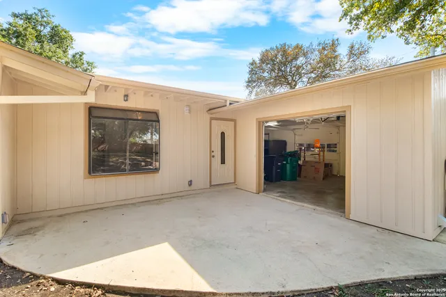 a view of backyard with green space