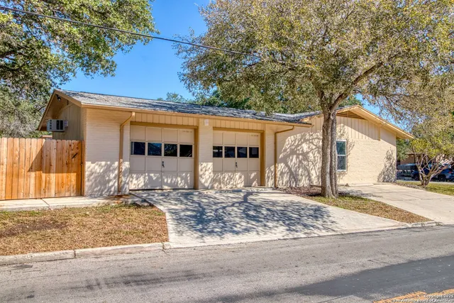 front view of a house with a trees