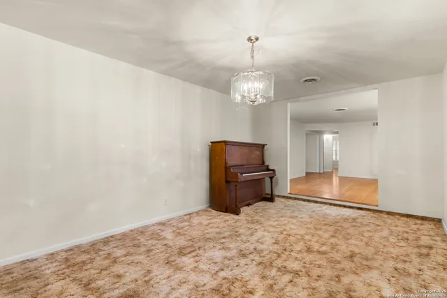a room with furniture and wooden floor