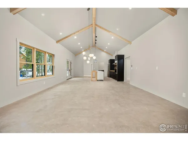 a view of a hall with a ceiling fan