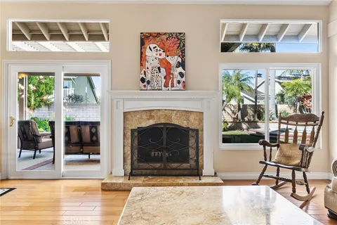 a kitchen with stainless steel appliances granite countertop a refrigerator a stove and a sink